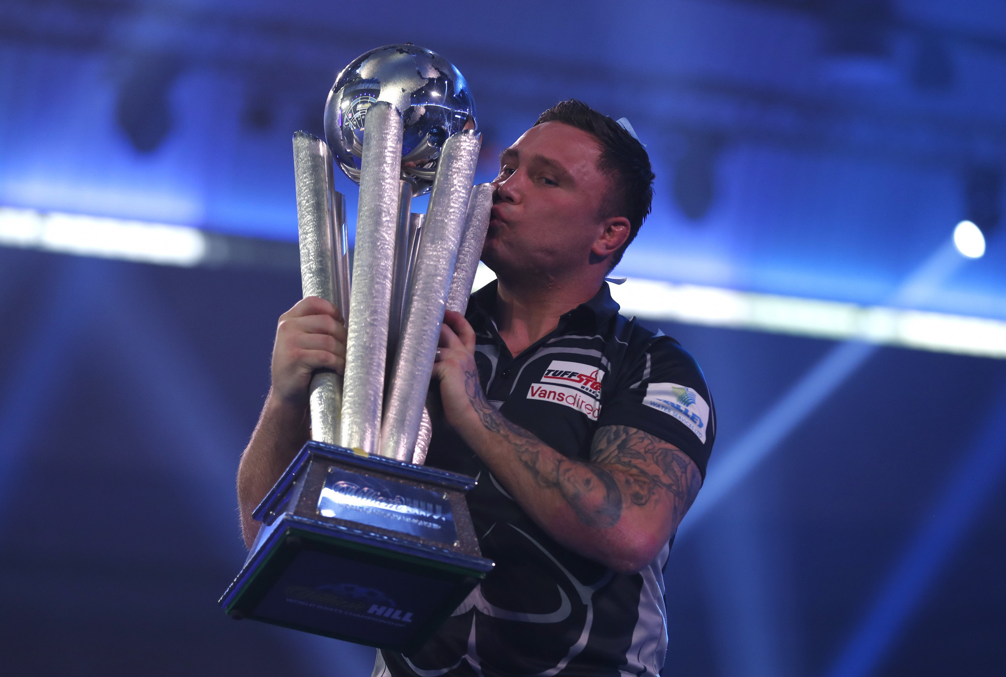 Price wins maiden PDC World Darts Championship alt and tops rankings